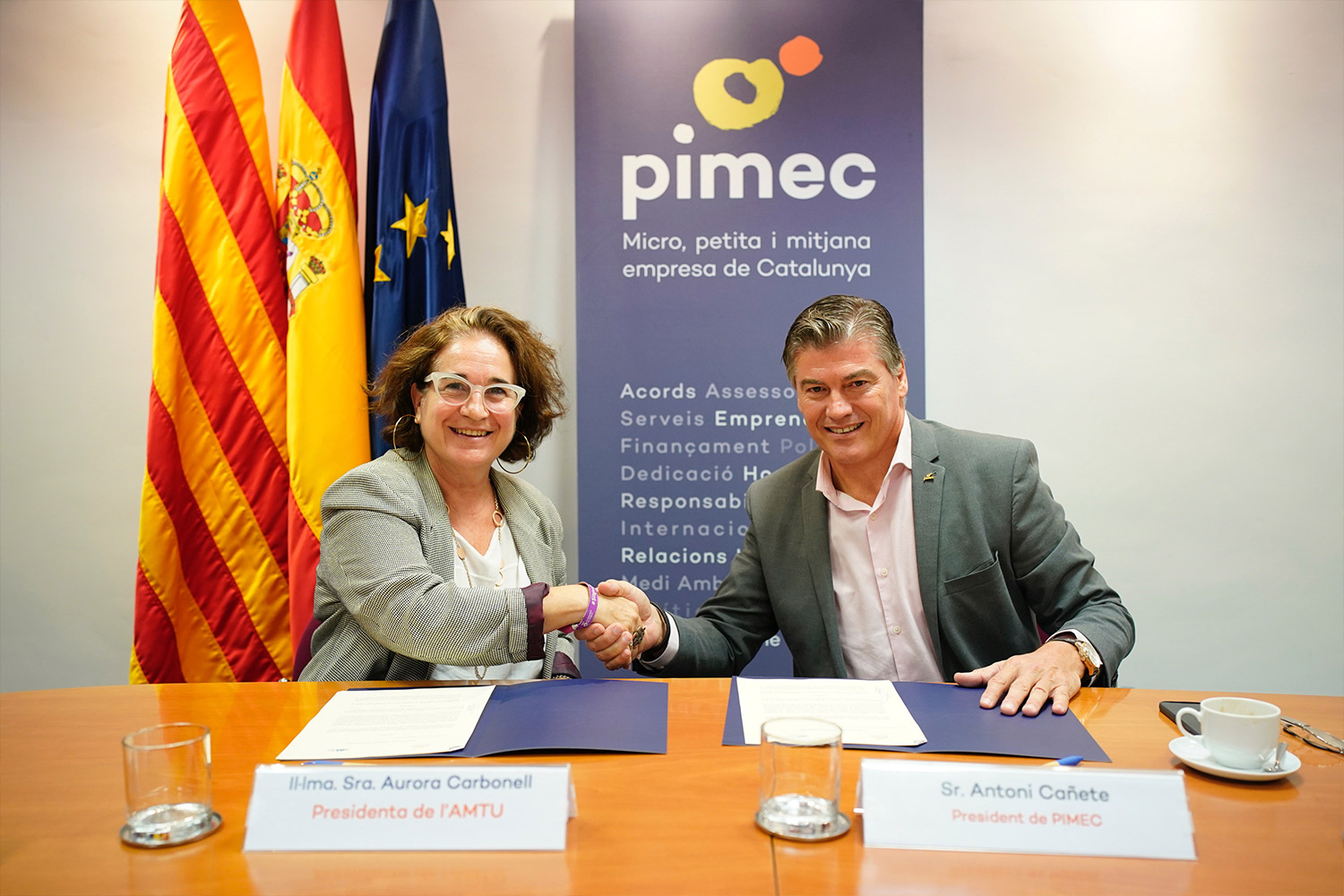 (d'equerra a dreta) La presidenta de l’AMTU, Aurora Carbonell, i el president de PIMEC, Antoni Cañete > AMTU